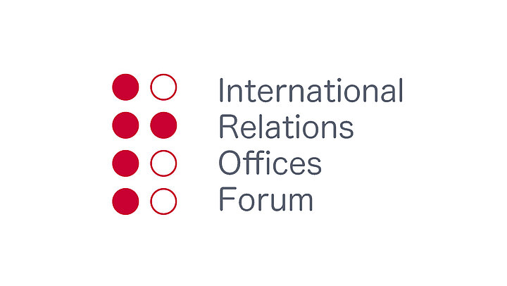 Logotype composed of red circles in a two vertical rows and a text: International Relations Offices Forum. 