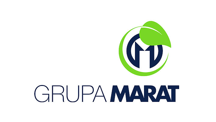 The logo consists of a circular graphic with a dark blue letter "M" inside and a green leaf as part of the border. Under the graphics, a dark blue text "GRUPA MARAT"